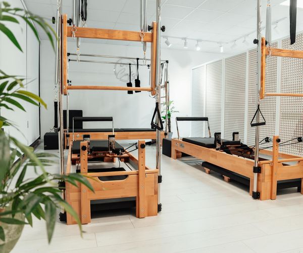 Bright and clean studio interior for exercise and relaxation.